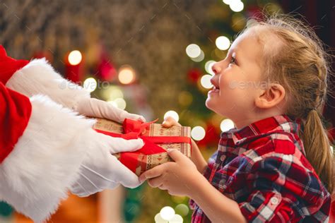 Santa Claus Giving Ts To Children