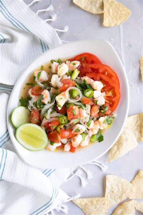 Juicy shrimp is marinated in a zesty vibrant mixture along with tomatoes, cucumber, jalapeño, onion, mangoes and cilantro. Shrimp Ceviche Recipe (How to Make Shrimp Ceviche) - The Forked Spoon