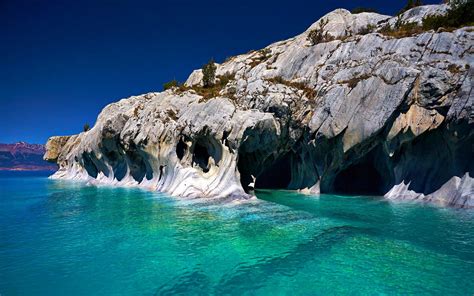 Gray Rock Mountain Beside Body Of Water Nature Landscape Cave