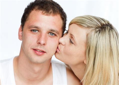 Premium Photo Woman Kissing A Handsome Man