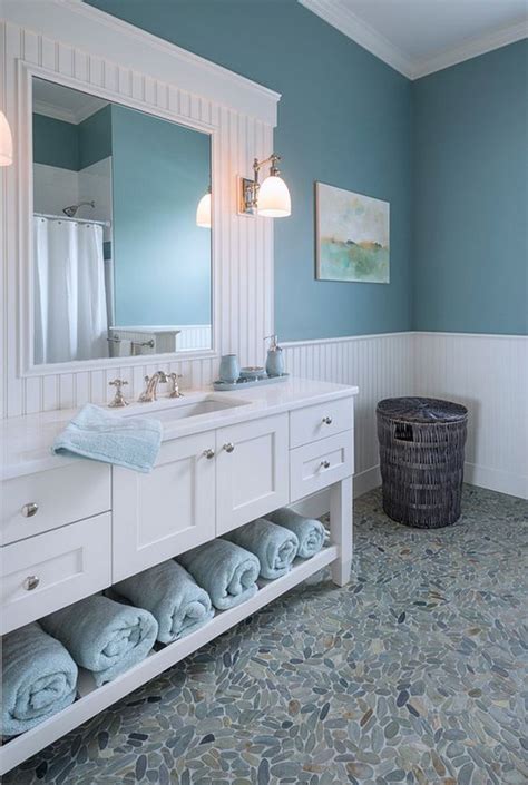 For a pop of color, choose a roller in a contrasting shade to your bathroom's color scheme. 69 Sea-Inspired Bathroom Décor Ideas - DigsDigs