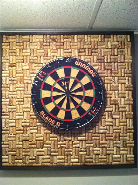 Custom dartboard backing and dart holder i made. Corks Made by my husband from Many corks collected. Dartboard backboard. Frame made of 33" x 33 ...