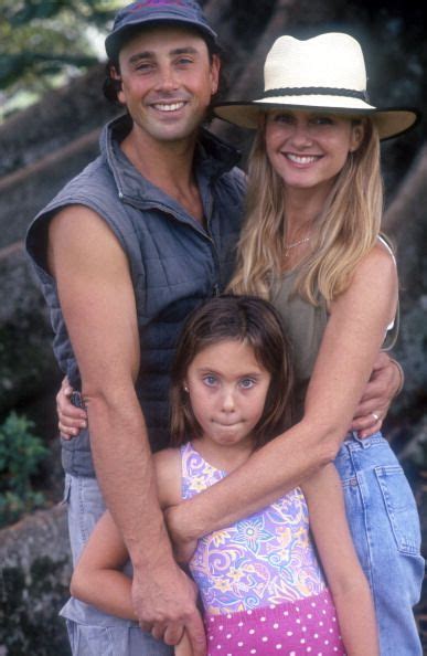 Australian Actress And Singer Olivia Newtonjohn With Her Husband Matt Lattanzi And Their Daugh