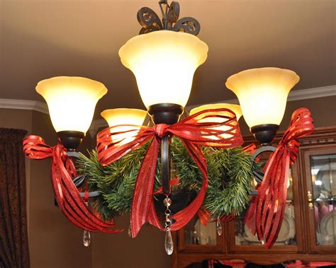 Simple Way To Decorate A Dining Room Light With Garland Red Bows And
