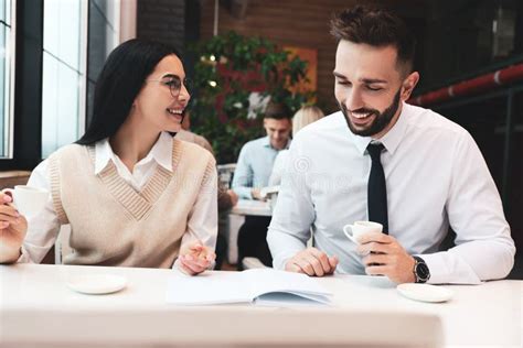 Coworkers Talking In Cafe During Coffee Break Stock Image Image Of