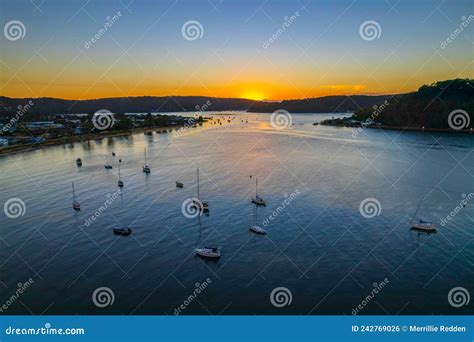 Aerial Sunrise Waterscape With Boats And Clear Skies Stock Photo