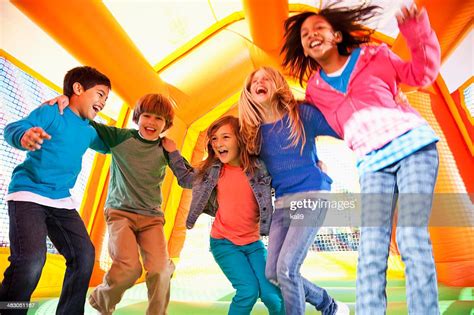 Children In Bounce House High Res Stock Photo Getty Images