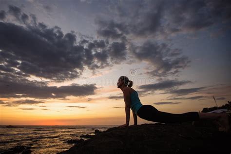 Fitness Woman Doing Yoga Exercises On The Ocean Coast Stock Image Image Of Lifestyle Girl