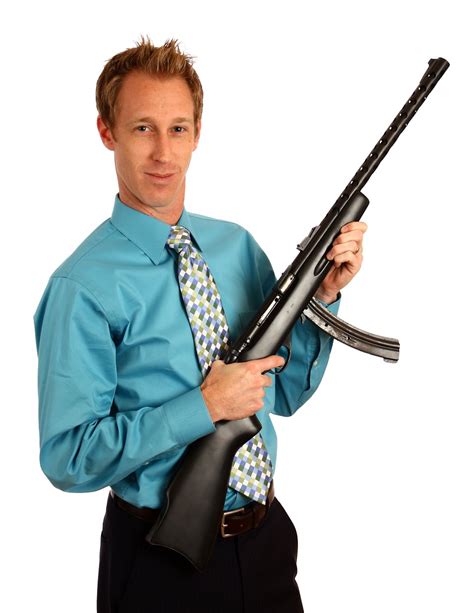 Rifle Free Stock Photo A Young Businessman Holding A Rifle 13319