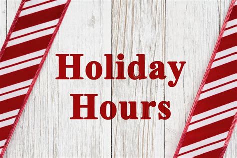 Holiday Hours Sign On Weathered Wood Stock Photo Image Of Stripes