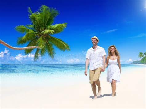 Couple Relaxing On The Beach Stock Image Image Of Blue Lifestyles