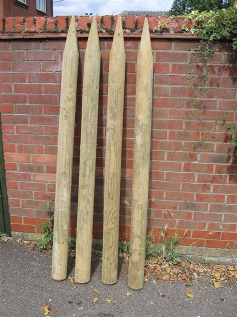 12 Half round wooden treated fencing posts | in Norwich, Norfolk | Gumtree