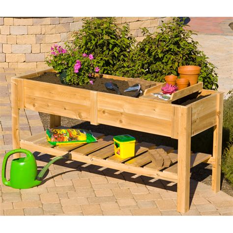 Outdoor planter boxes for raised garden beds. DMC Cedar Wood Raised Planter Box with Tray at Hayneedle