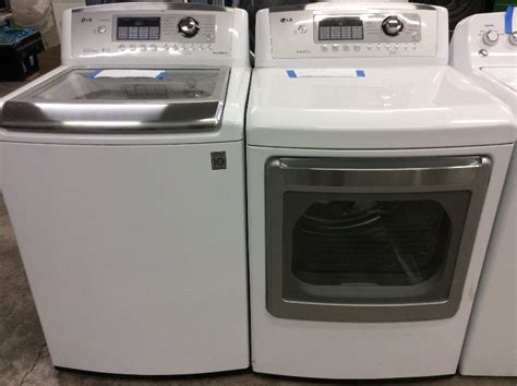 Lg White Top Load Washer Without Agitator And Matching Gas Dryer A1