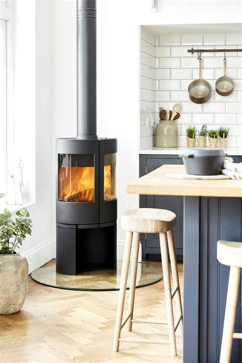Basking in the warmth of a fire reminds us of our finest moments in life. Morsø 6643 in 2020 | Modern wood burning stoves, Wood ...