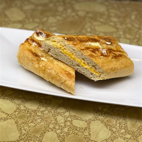 Cheese Cuban Toast • Kikis Restaurant Lounge