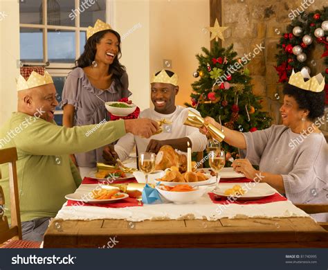 Much will depend upon the ethnicity and heritage the family shares, and some of it will depend upon location and custom. Adult African American Family Having Christmas Stock Photo 81740995 - Shutterstock