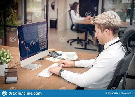 Broker Or Investor Analyzing Chart In Office Stock Photo - Image of ...