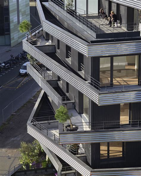 Inoxia Apartments Feature Jagged Wraparound Balconies Apartment
