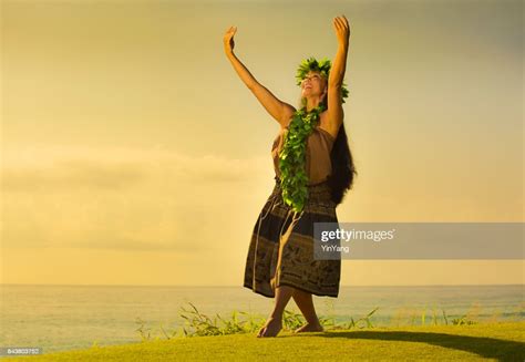 Portrait Of Hawaiian Hula Dancer On The Beach At Sunset High Res Stock