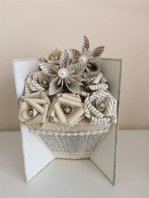 In these examples, each heart has 80 pages (40 sheets); Folded book art vase shape with paper flowers