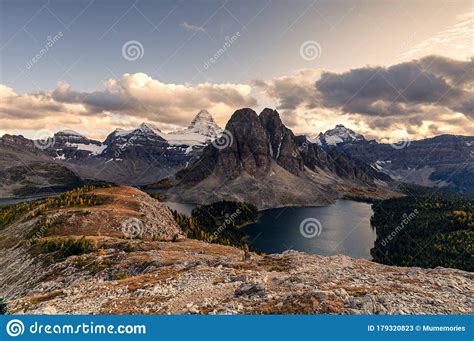 Mount Assiniboine With Lake On Nublet Peak In Autumn Forest On Sunset