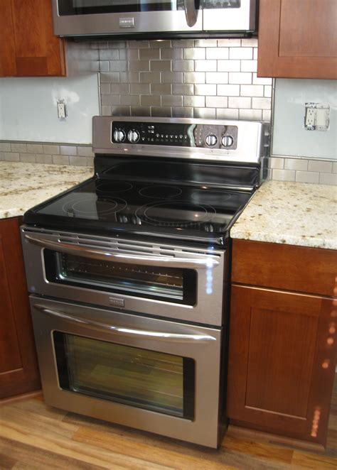 If you're considering stove backsplash panels, like mosaic tile on mesh backing, installation will require tools and supplies like tile adhesive, grout, a trowel, grout float and more. Kitchen: Cool Kitchen Decoration With Backsplash Behind ...