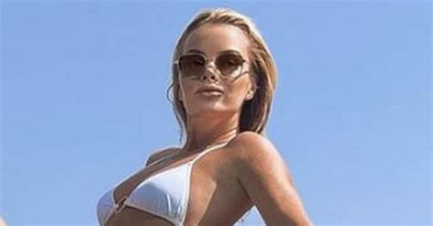 Amanda Holden Wows In Tiny Bikini As She Turns Bond Girl With Epic Hair