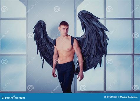 Cthe Man With Angel Wings Stock Photo Image Of Wings 87649364