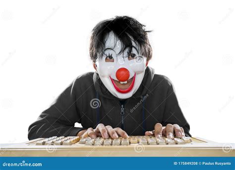Unknown Hacker Wearing A Clown Mask Stock Photo Image Of Cyberspace