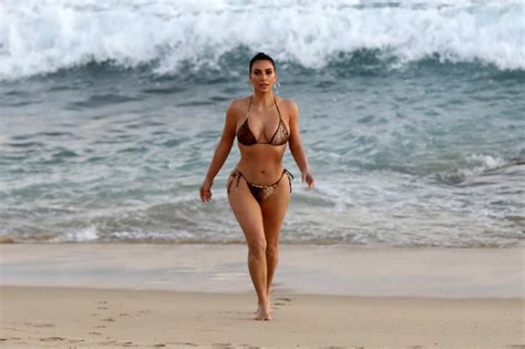 Kim Kardashian Shows Off Her Curves In A Snakeskin Print Bikini After Filming Kuwtk In Malibu