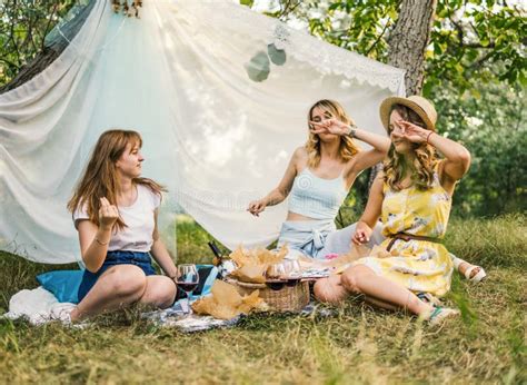 Group Of Girls Friends Making Picnic Outdoor They Have Fun Stock Image