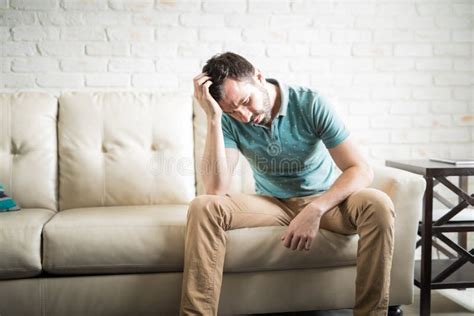 Sad Man Thinking In The Living Room Stock Image Image Of Latin