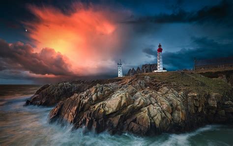 Lighthouse On Rocky Sea Hd Wallpaper Background Image 1920x1200