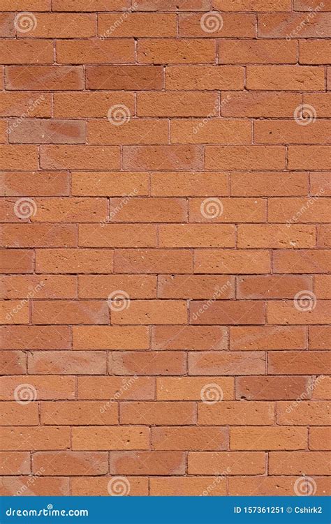 Traditional Brick Wall Texture With Orange Color Bricks In Varying