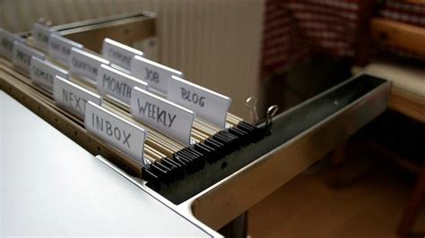They are most widely used in file cabinets having movable drawers in which are mounted racks or rails on which the filing folders are suspended. Create Hanging File Storage from IKEA Shelf Brackets