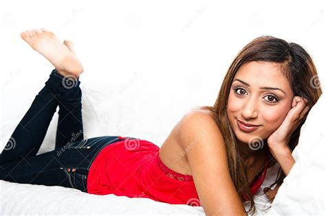 Indian Girl On The Sofa Close Up Smiling Stock Image Image Of Leisure Indoors 21684911