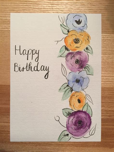 A Happy Birthday Card With Watercolor Flowers