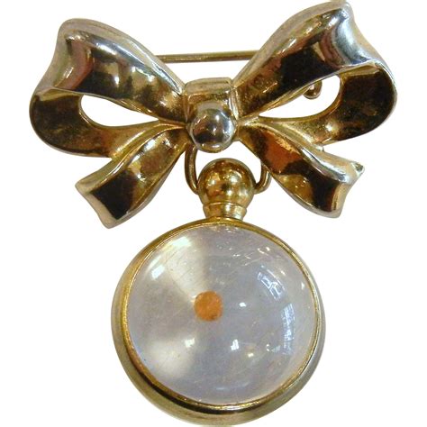 Vintage Coro Costume Jewelry Brooch Features A Ribbon Bow With A Clear
