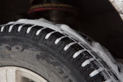 Studded Tires In Winter Snow In The Tire On The Winter Road Stock