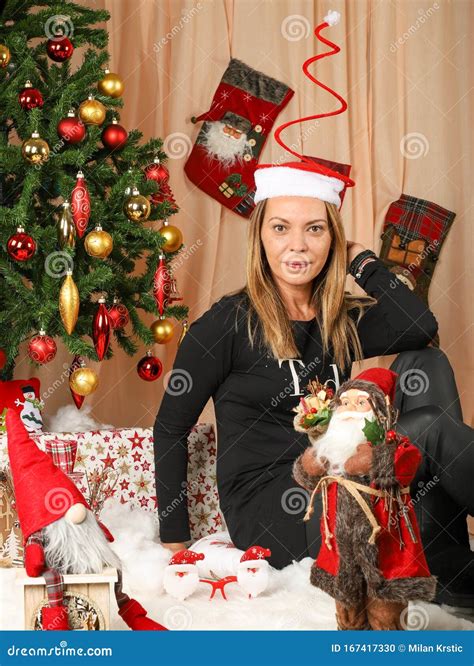 Beautiful Woman In Front Of Christmas Tree Stock Photo Image Of Blue Ball