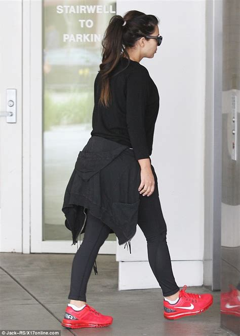 Kim Kardashian Covers Up Her Bump In All Black Gym Wear As She Heads