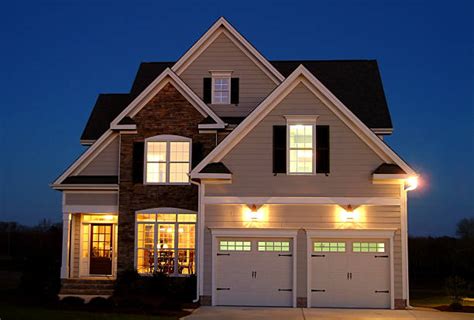 6900 Suburban House At Night Stock Photos Pictures And Royalty Free