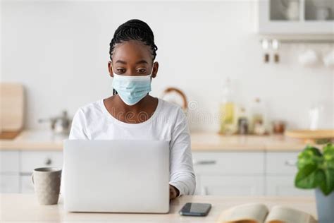 Portrait Of Black Woman In Mask Working On Computer Stock Image Image