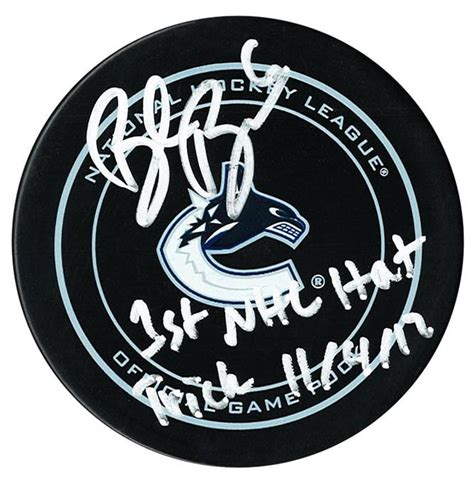 brock boeser autographed vancouver canucks 1st nhl hat trick official puck cojo sport