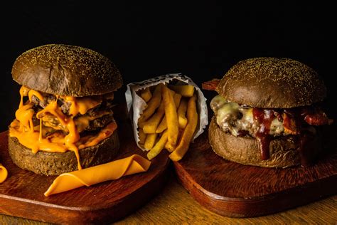 Two Burgers With Fries And Sauce · Free Stock Photo