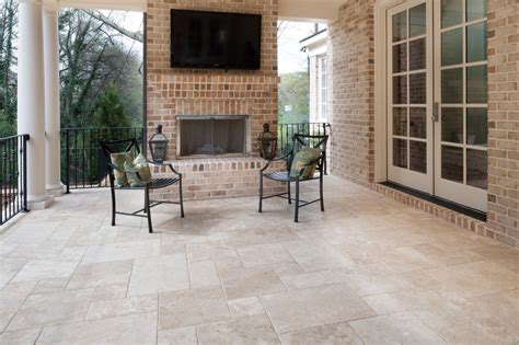 Outdoor tile has become an integral part of the design of a home and its landscaping—we now expect to have some we love this contemporary square patio tile that allows the green grass to attract attention. Outdoor Tiles | The Tile Home Guide