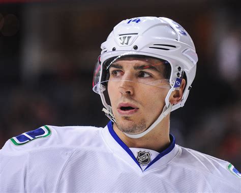 Sensing this rocket blast was about to go off, teammate alex burrows did what any of us would have done if we were in fact alex burrows: Alex Burrows Photos Photos - Zimbio