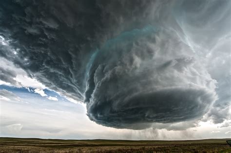 New users enjoy 60% off. Atmospheric Phenomena: A Supercell Storm Cloud Forming over Wyoming