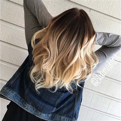 The ombre hair goes from a light shade of auburn to white blonde tips. 21 Stylish Ombre Color Ideas for Brunettes | StayGlam